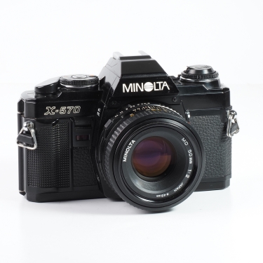 Minolta X-570 35mm Film SLR Camera with 50mm f2 Lens (EX) used