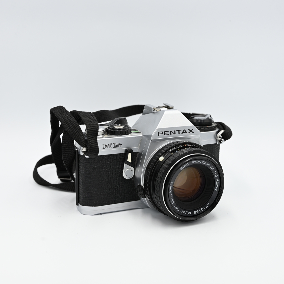 Pentax MG 35mm Film SLR Camera with 50mm F2 Lens (As Is) Used