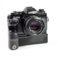 Minolta X-700 35mm Film SLR Camera w/ Motor Drive 1 & Multi-Function Back + 50mm F1.7 (EX)(NEW SEALS)) Used