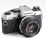 Olympus OM-10 35mm Film SLR Camera w/ 50mm f1.8 Auto-S Lens (EX+) Used