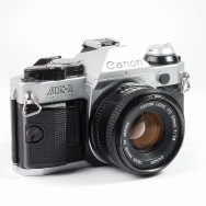 Canon AE-1 Program 35mm Film SLR Camera with 50mm F1.8 Lens (EX+ - CLA, New Seals) Used